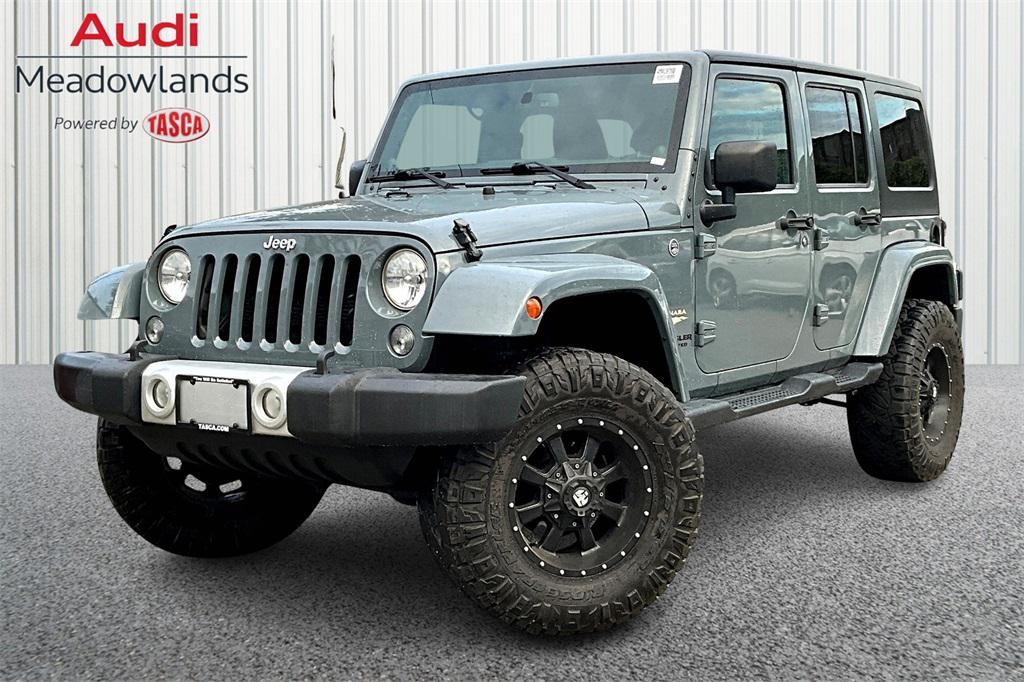 used 2014 Jeep Wrangler Unlimited car, priced at $17,488