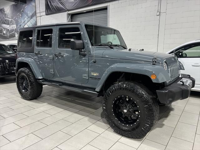 used 2014 Jeep Wrangler Unlimited car, priced at $18,888
