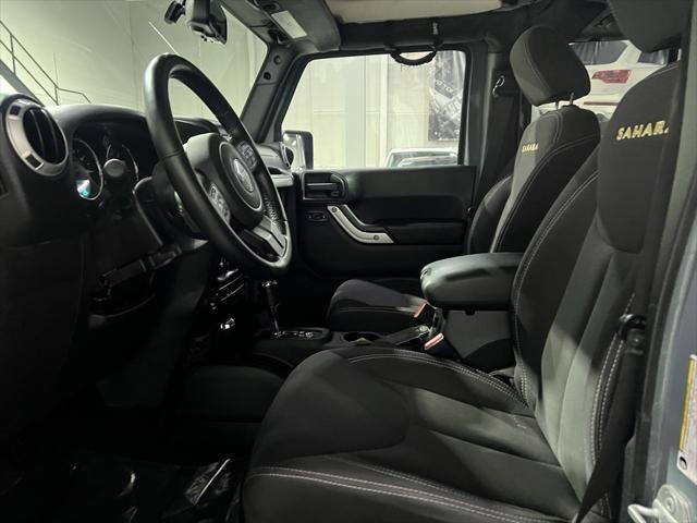 used 2014 Jeep Wrangler Unlimited car, priced at $18,888