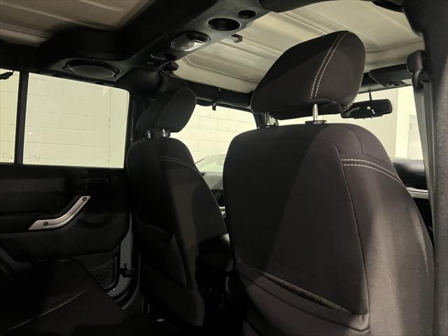 used 2014 Jeep Wrangler Unlimited car, priced at $18,888