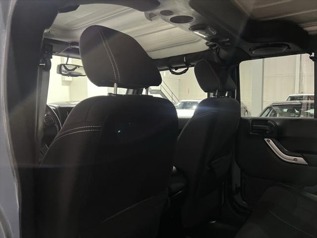 used 2014 Jeep Wrangler Unlimited car, priced at $18,888