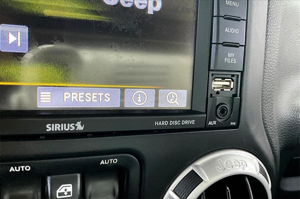 used 2014 Jeep Wrangler Unlimited car, priced at $17,488
