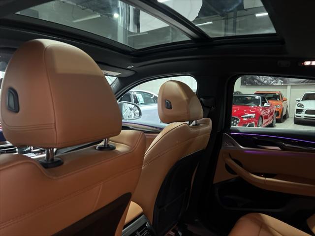 used 2022 BMW X4 car, priced at $38,988
