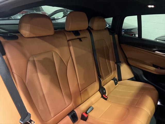used 2022 BMW X4 car, priced at $38,988