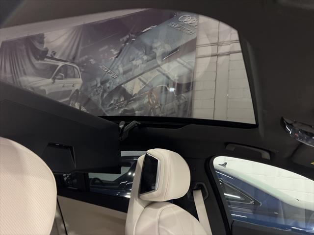 used 2024 BMW 740 car, priced at $89,900