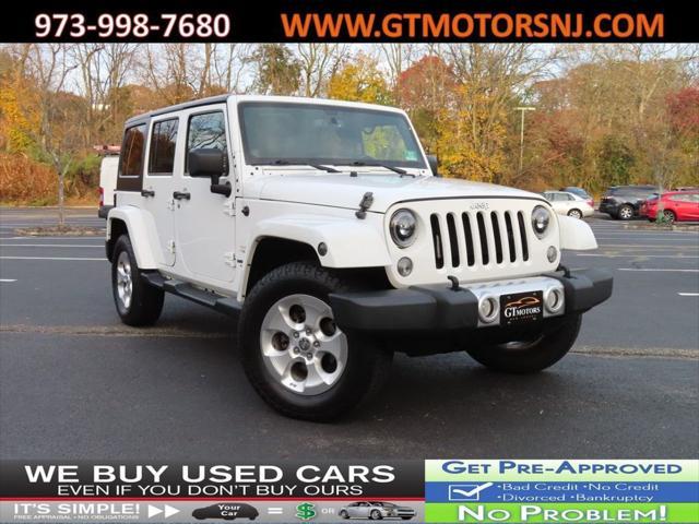 used 2014 Jeep Wrangler Unlimited car, priced at $15,295