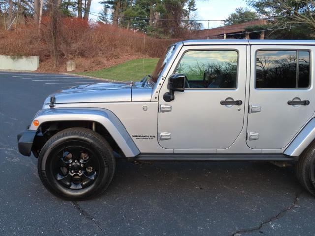 used 2015 Jeep Wrangler Unlimited car, priced at $17,595