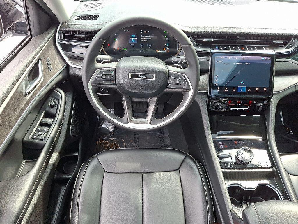 used 2023 Jeep Grand Cherokee 4xe car, priced at $30,000