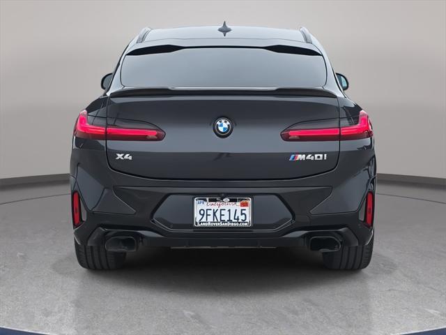 used 2023 BMW X4 car, priced at $57,250