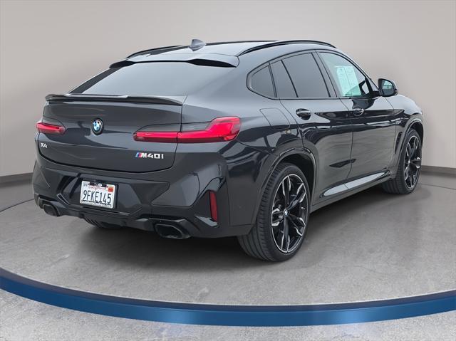 used 2023 BMW X4 car, priced at $57,250