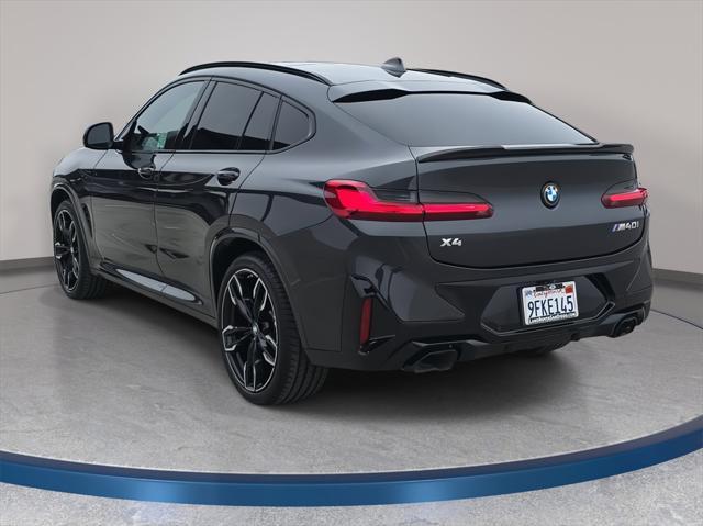 used 2023 BMW X4 car, priced at $57,250