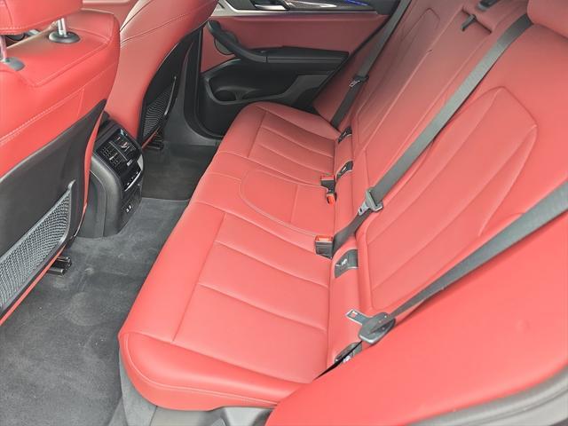 used 2023 BMW X4 car, priced at $57,250