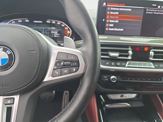 used 2023 BMW X4 car, priced at $57,250