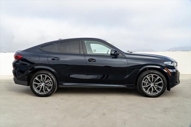 used 2024 BMW X6 car, priced at $63,330