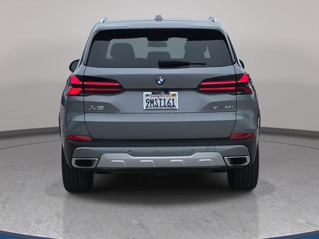 used 2025 BMW X5 car, priced at $59,880