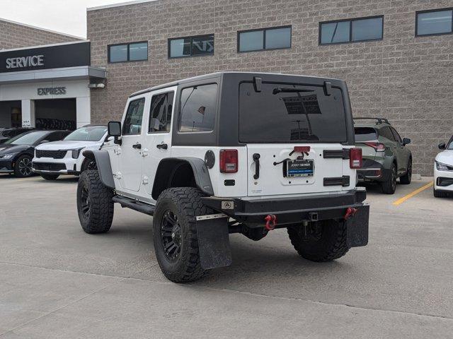 used 2014 Jeep Wrangler Unlimited car, priced at $21,235