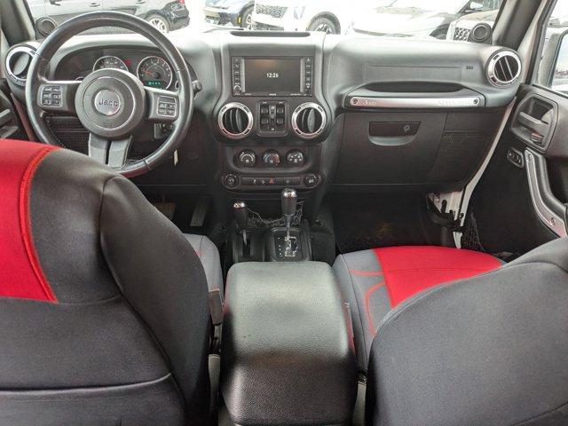 used 2014 Jeep Wrangler Unlimited car, priced at $21,235