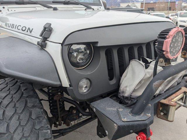 used 2014 Jeep Wrangler Unlimited car, priced at $21,235