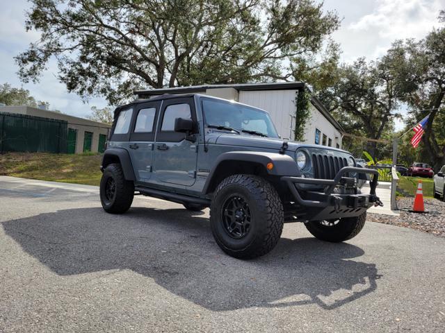 used 2015 Jeep Wrangler Unlimited car, priced at $17,899