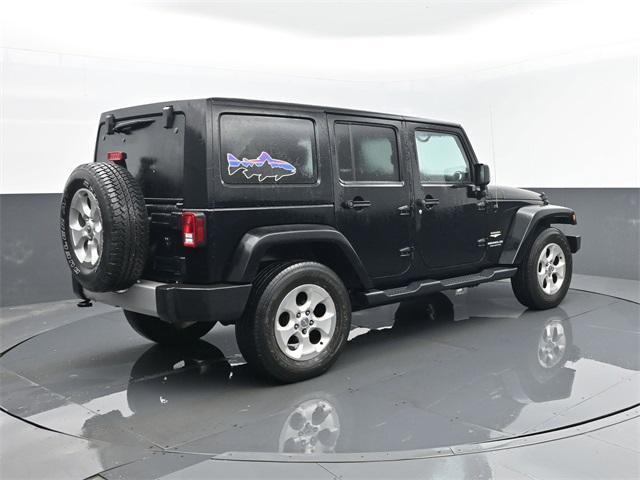used 2014 Jeep Wrangler Unlimited car, priced at $14,878