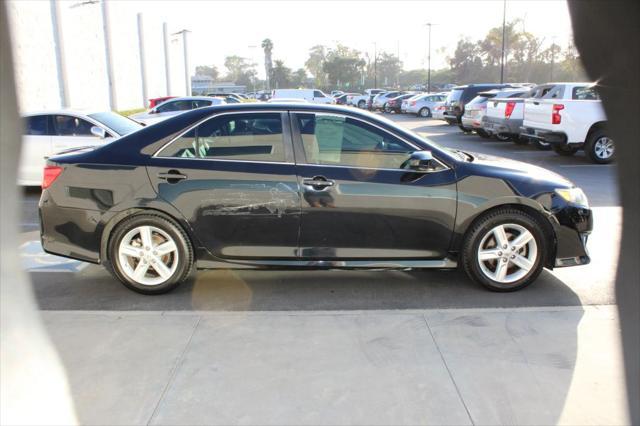 used 2014 Toyota Camry car, priced at $9,999