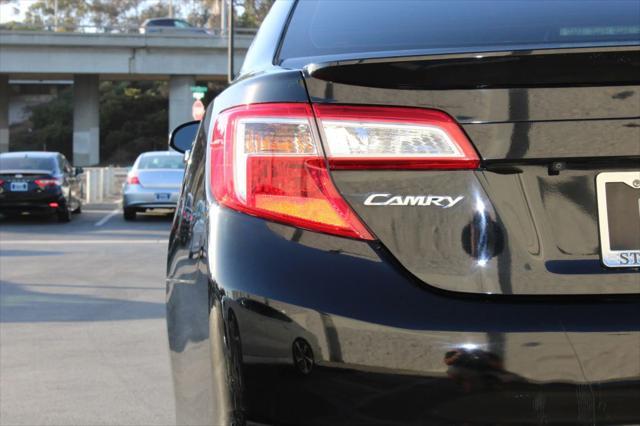 used 2014 Toyota Camry car, priced at $9,999