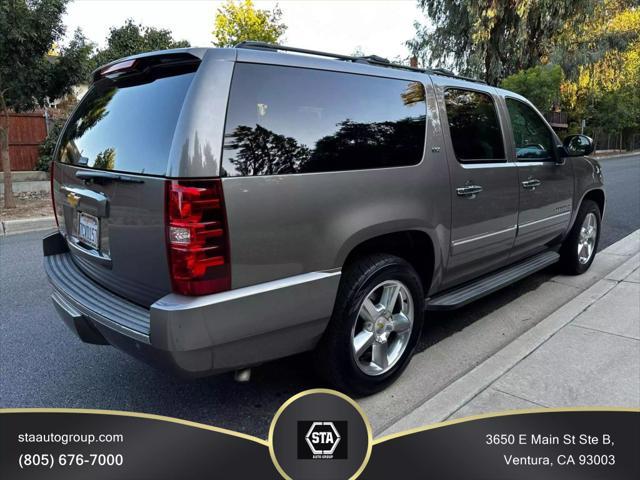 used 2014 Chevrolet Suburban car, priced at $15,395