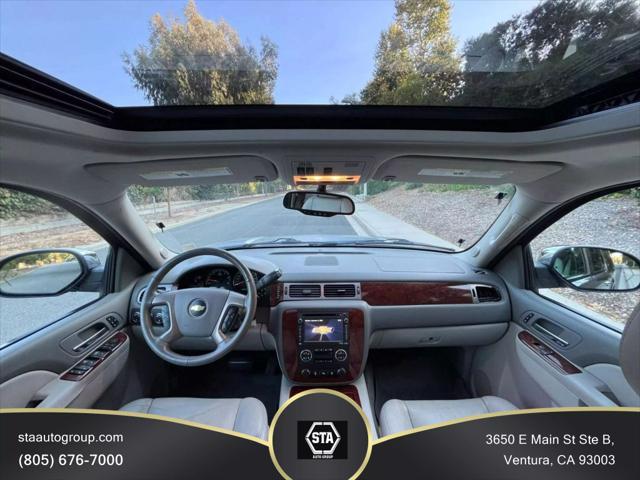 used 2014 Chevrolet Suburban car, priced at $15,395