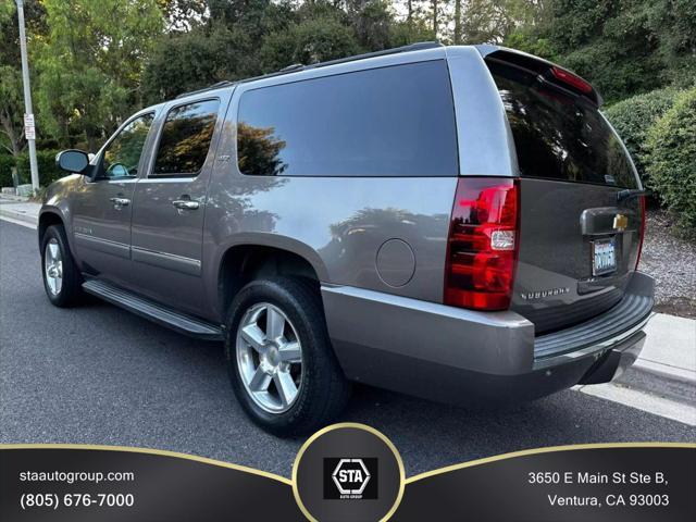 used 2014 Chevrolet Suburban car, priced at $15,395