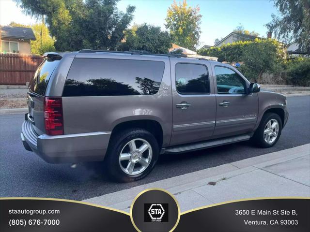 used 2014 Chevrolet Suburban car, priced at $15,395