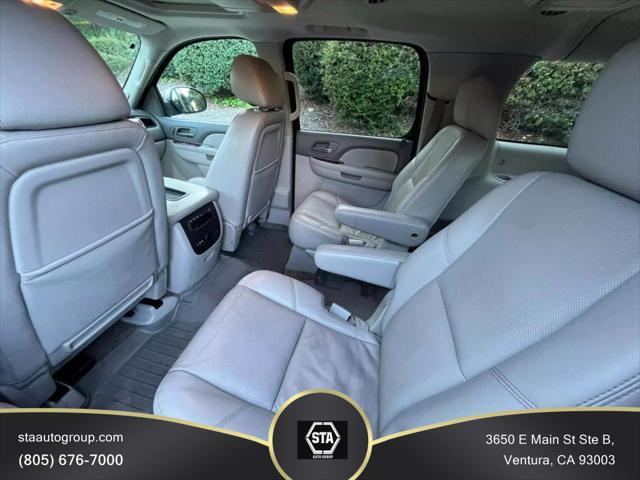 used 2014 Chevrolet Suburban car, priced at $15,395