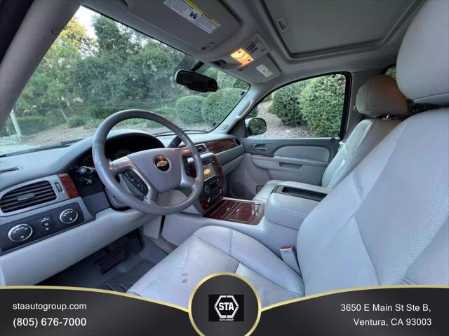 used 2014 Chevrolet Suburban car, priced at $15,395