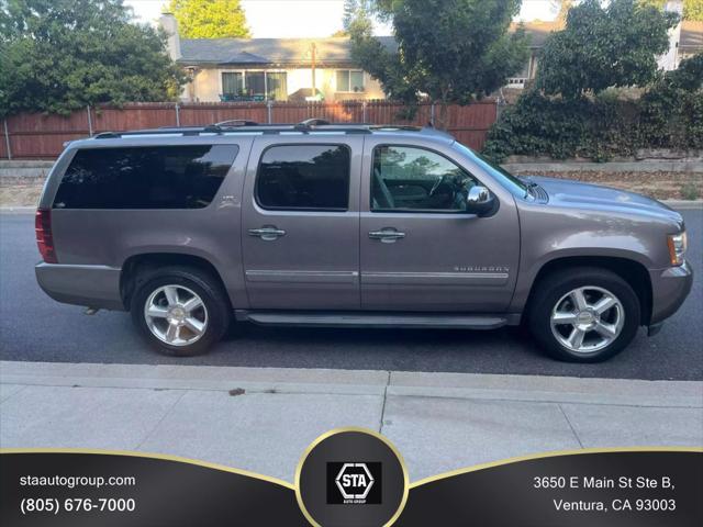 used 2014 Chevrolet Suburban car, priced at $15,395