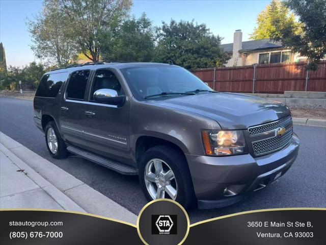 used 2014 Chevrolet Suburban car, priced at $15,395