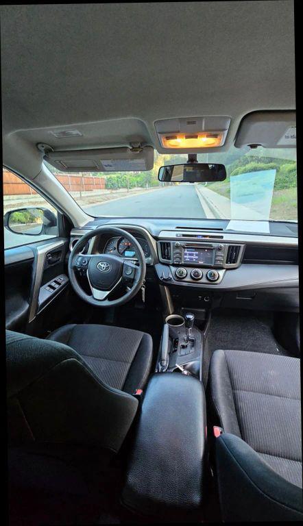 used 2014 Toyota RAV4 car, priced at $13,999