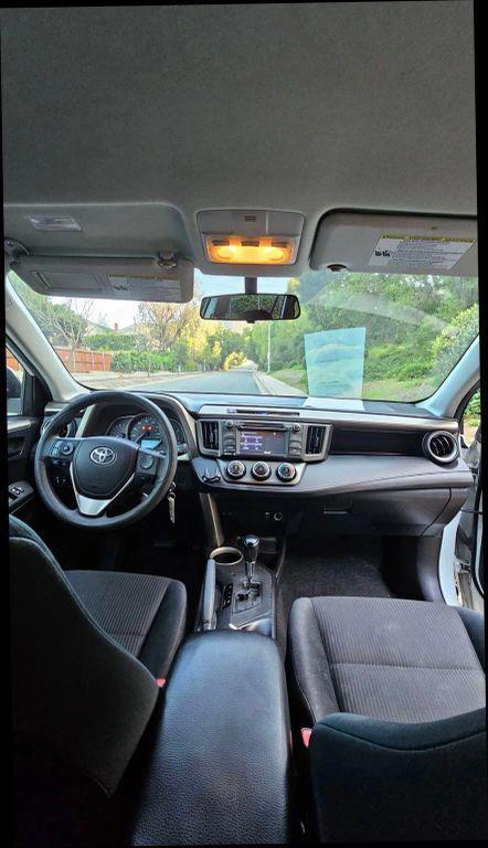 used 2014 Toyota RAV4 car, priced at $13,999