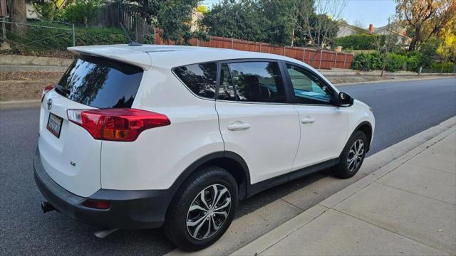 used 2014 Toyota RAV4 car, priced at $13,999