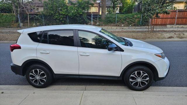 used 2014 Toyota RAV4 car, priced at $13,999