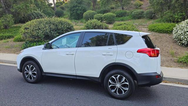 used 2014 Toyota RAV4 car, priced at $13,999