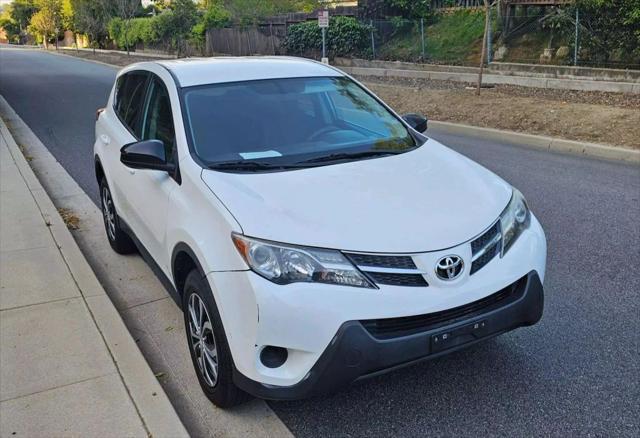 used 2014 Toyota RAV4 car, priced at $13,999
