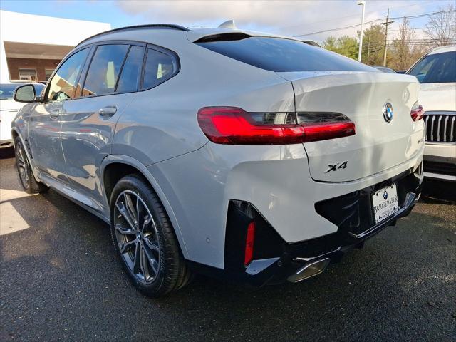 used 2022 BMW X4 car, priced at $39,911