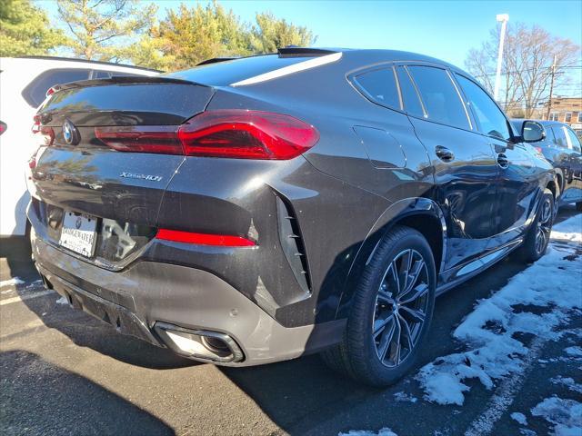 new 2025 BMW X6 car, priced at $83,405