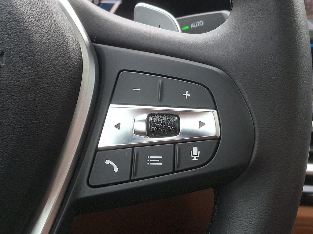 used 2023 BMW 330e car, priced at $34,412