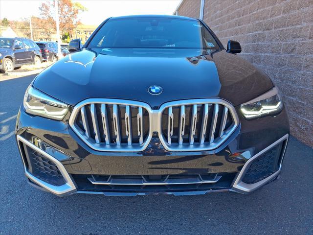 used 2021 BMW X6 car, priced at $55,417