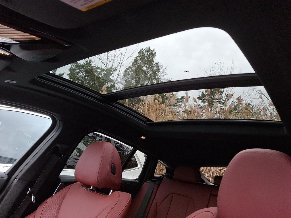 used 2025 BMW X4 car, priced at $59,697