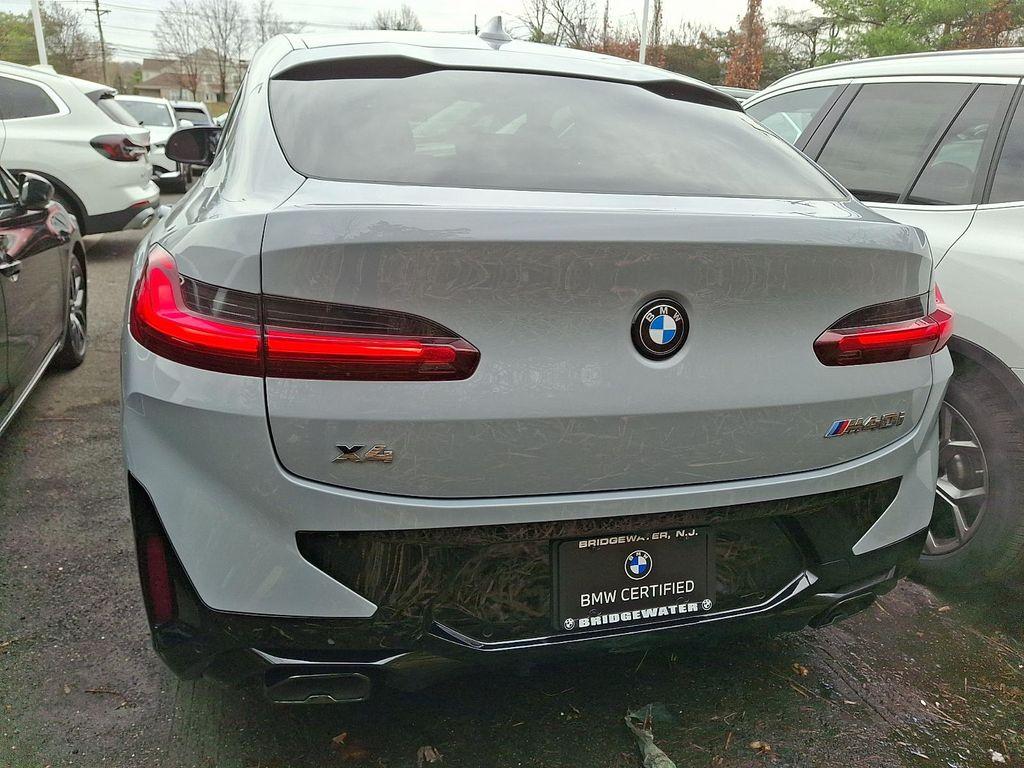 used 2025 BMW X4 car, priced at $59,697