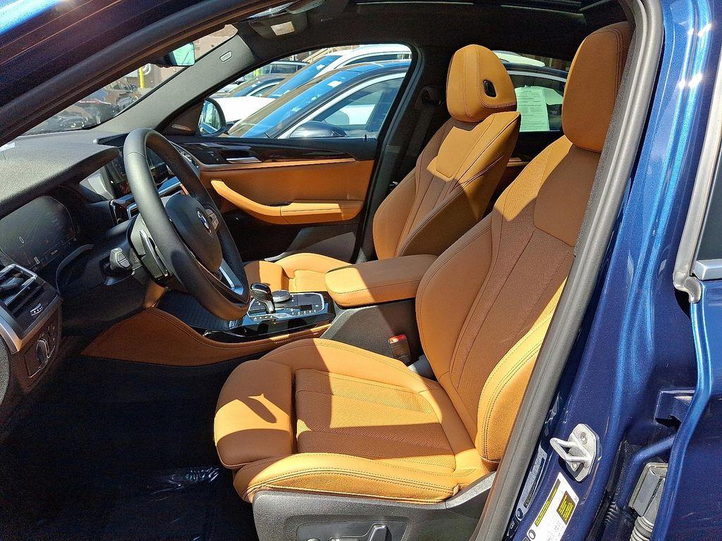 used 2025 BMW X4 car, priced at $55,894