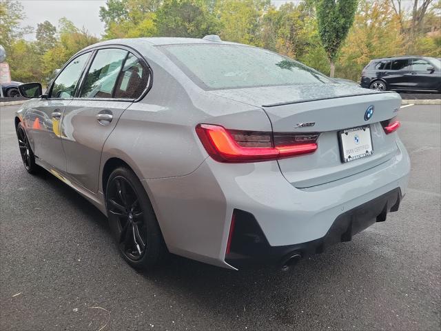 used 2023 BMW 330e car, priced at $44,618