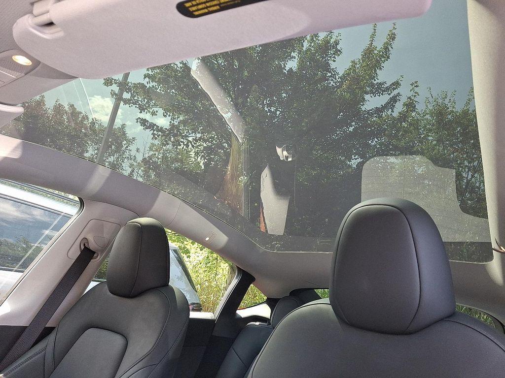 used 2025 Tesla Model Y car, priced at $39,112