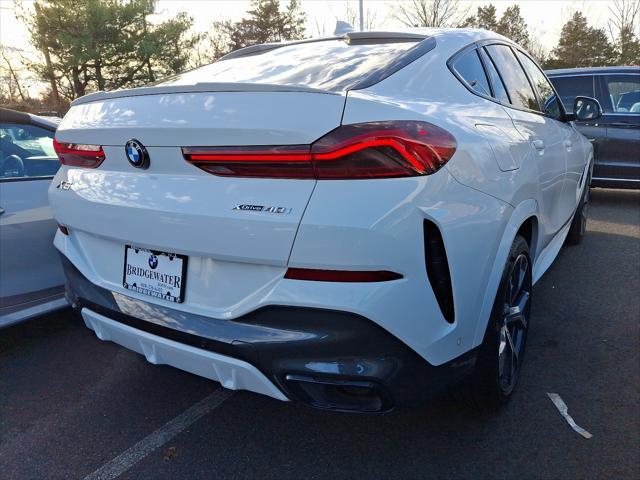 used 2022 BMW X6 car, priced at $51,947